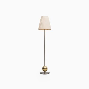 Stilarmatur in Tranås floor lamp in brass at Studio Schalling