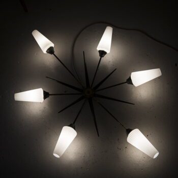 Mid century sputnik wall lamp produced in Italy at Studio Schalling