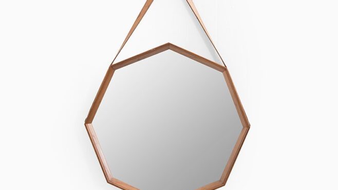 Octagonal teak mirror with leather strap and brass at Studio Schalling