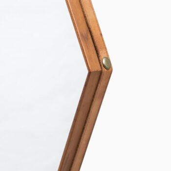 Octagonal teak mirror with leather strap and brass at Studio Schalling