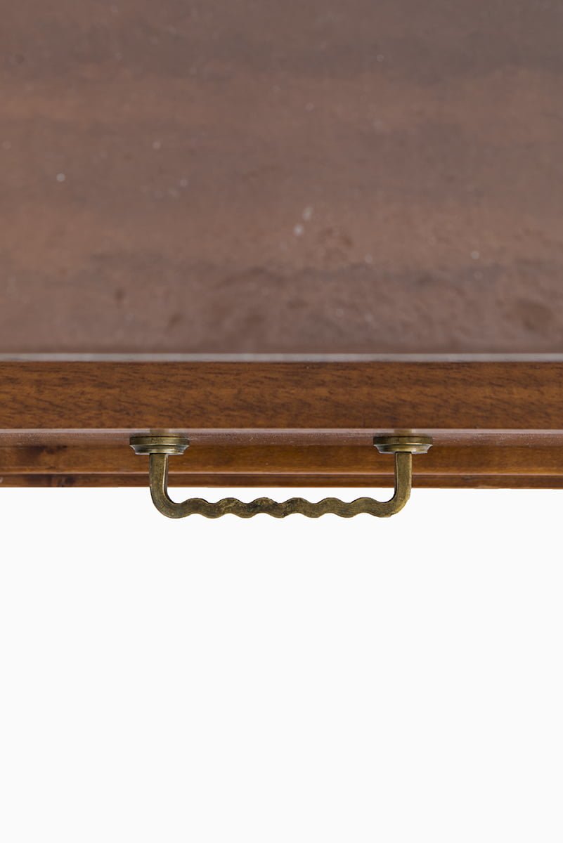 Bedside tables in mahogany and brass at Studio Schalling
