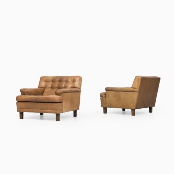 Arne Norell Merkur easy chairs in cognac brown leather at Studio Schalling