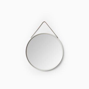 White lacquered round mirror with leather strap at Studio Schalling
