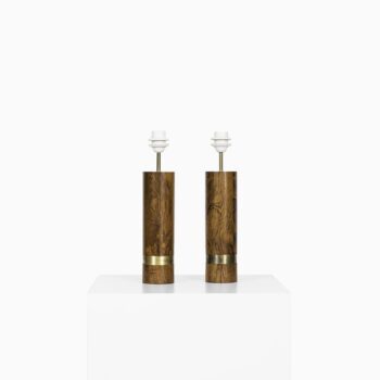 A pair of table lamps in rosewood and brass at Studio Schalling