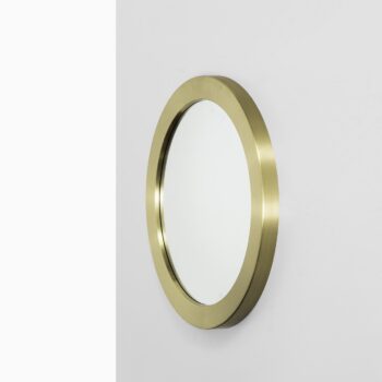 Round mirror in brass produced by Glasmäster at Studio Schalling
