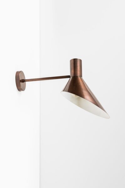 Pair of big wall lamps in copper at Studio Schalling