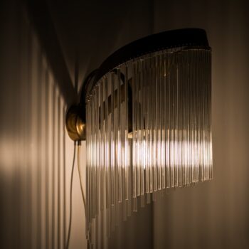 Art Deco wall lamp in brass and glass at Studio Schalling