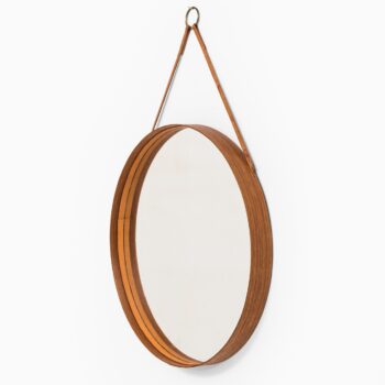 Round mirror in teak and leather by Glas mäster at Studio Schalling