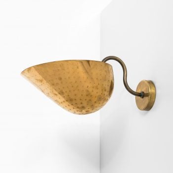 Carl-Axel Acking wall lamps in brass at Studio Schalling