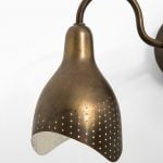 Wall lamp in brass at Studio Schalling