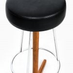 Bar stools in teak and chromed steel at Studio Schalling