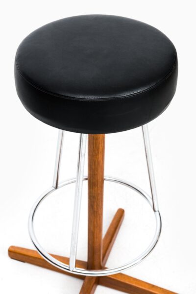 Bar stools in teak and chromed steel at Studio Schalling