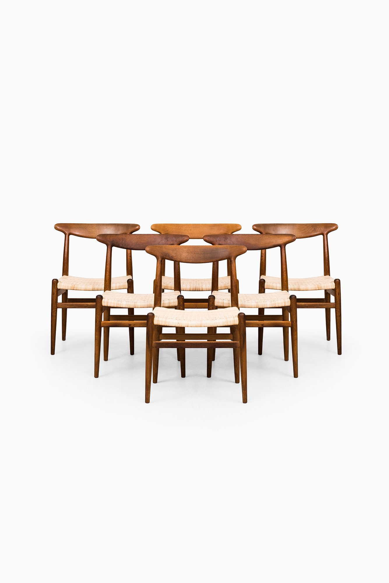 Hans Wegner dining chairs model W2 in oak at Studio Schalling