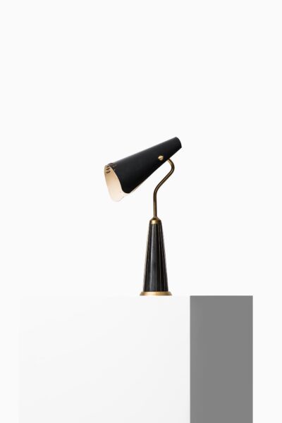 Table lamp with flexible shade in black metal at Studio Schalling