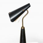 Table lamp with flexible shade in black metal at Studio Schalling