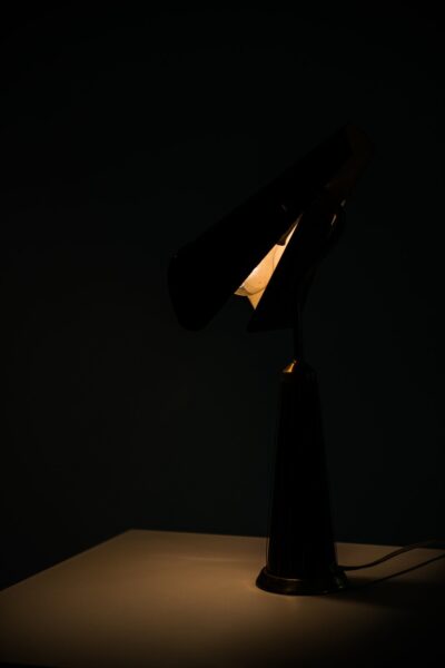 Table lamp with flexible shade in black metal at Studio Schalling