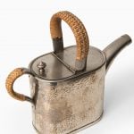 Teapot in metal and woven cane by Carl Deffner at Studio Schalling
