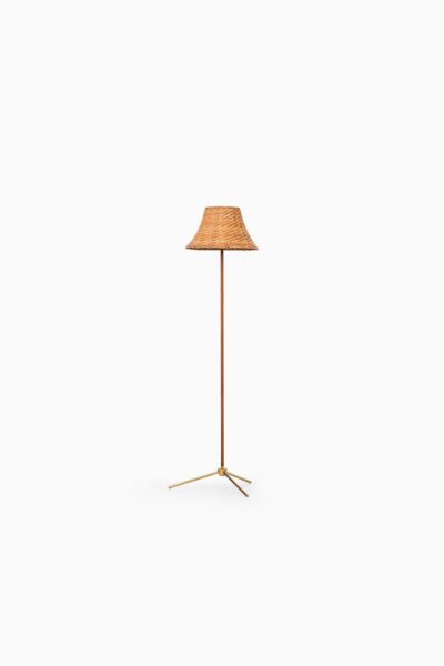 A pair of floor lamps by Bergbom in brass at Studio Schalling