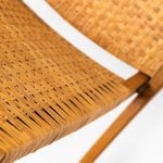 Hans Wegner folding chair in oak and cane at Studio Schalling