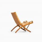 Hans Wegner folding chair in oak and cane at Studio Schalling