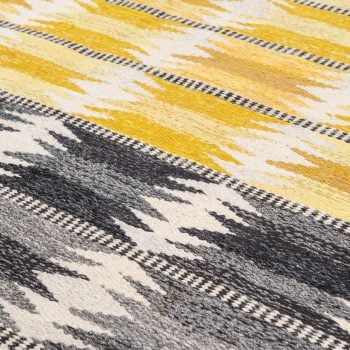 Ingrid Dessau carpet in grey and yellow at Studio Schalling