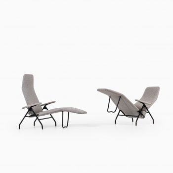 A pair of reclining chairs in black steel at Studio Schalling