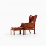 Mogens Koch wingback easy chair with stool at Studio Schalling