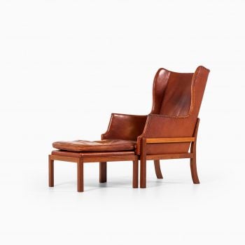 Mogens Koch wingback easy chair with stool at Studio Schalling