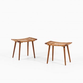A pair of stools in oak and woven cane at Studio Schalling