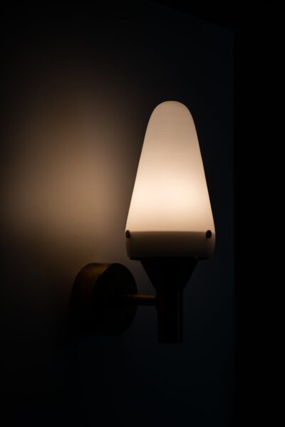 Hans-Agne Jakobsson wall lamps in brass and opal glass at Studio Schalling