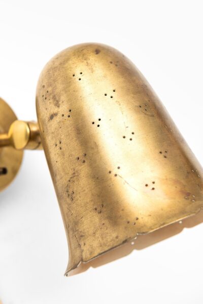 Boréns wall lamps in brass at Studio Schalling