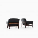 Easy chairs in rosewood and black leather at Studio Schalling