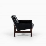 Easy chairs in rosewood and black leather at Studio Schalling
