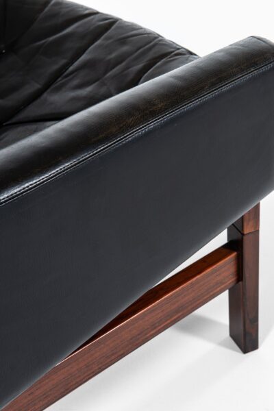 Easy chairs in rosewood and black leather at Studio Schalling