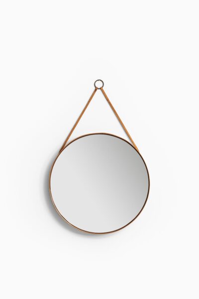 Round mirror in pine, brass and leather at Studio Schalling