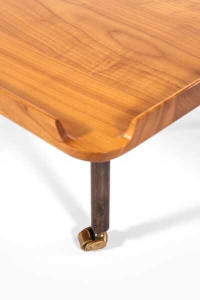 Finn Juhl side table in cherry and brass at Studio Schalling