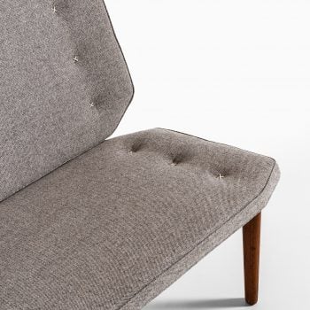 Sofa in teak with grey wool fabric at Studio Schalling
