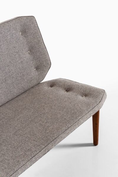 Sofa in teak with grey wool fabric at Studio Schalling