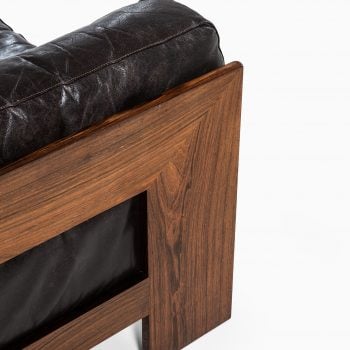 Pair of easy chairs in rosewood and leather at Studio Schalling