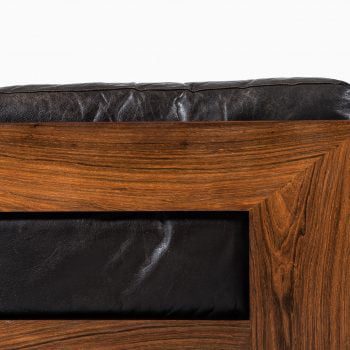 Pair of easy chairs in rosewood and leather at Studio Schalling