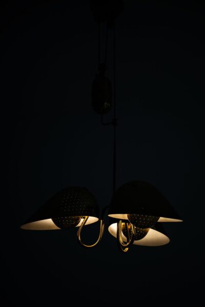Carl-Axel Acking ceiling lamp in brass at Studio Schalling