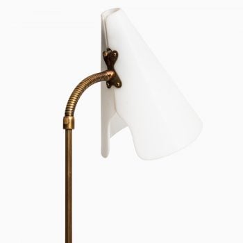 Floor lamp in brass with white lamp shade at Studio Schalling
