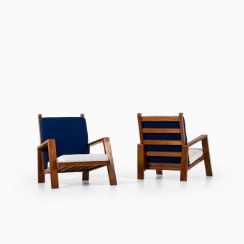 Pair of easy chairs in teak and fabric at Studio Schalling
