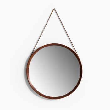 Round mirror in teak and brown leather at Studio Schalling