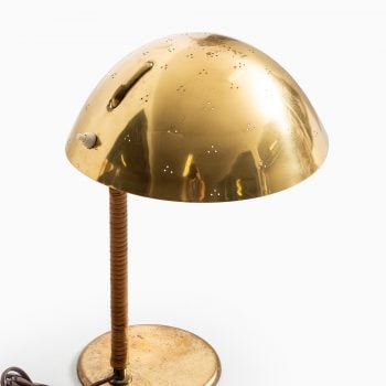 Paavo Tynell table lamp in brass and cane at Studio Schalling