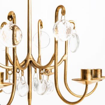 Erik Höglund chandelier in brass and glass at Studio Schalling