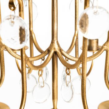 Erik Höglund chandelier in brass and glass at Studio Schalling