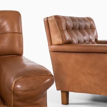 Arne Norell Merkur easy chairs in buffalo leather at Studio Schalling