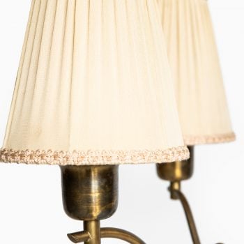 1940's height adjustable floor lamp in brass at Studio Schalling