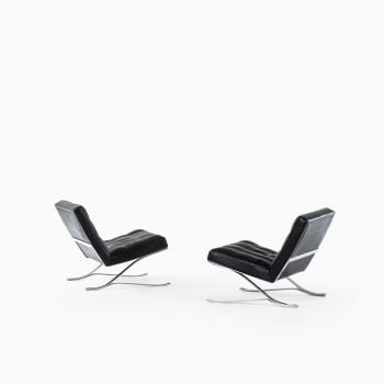 Sam Larsson easy chairs in black leather at Studio Schalling
